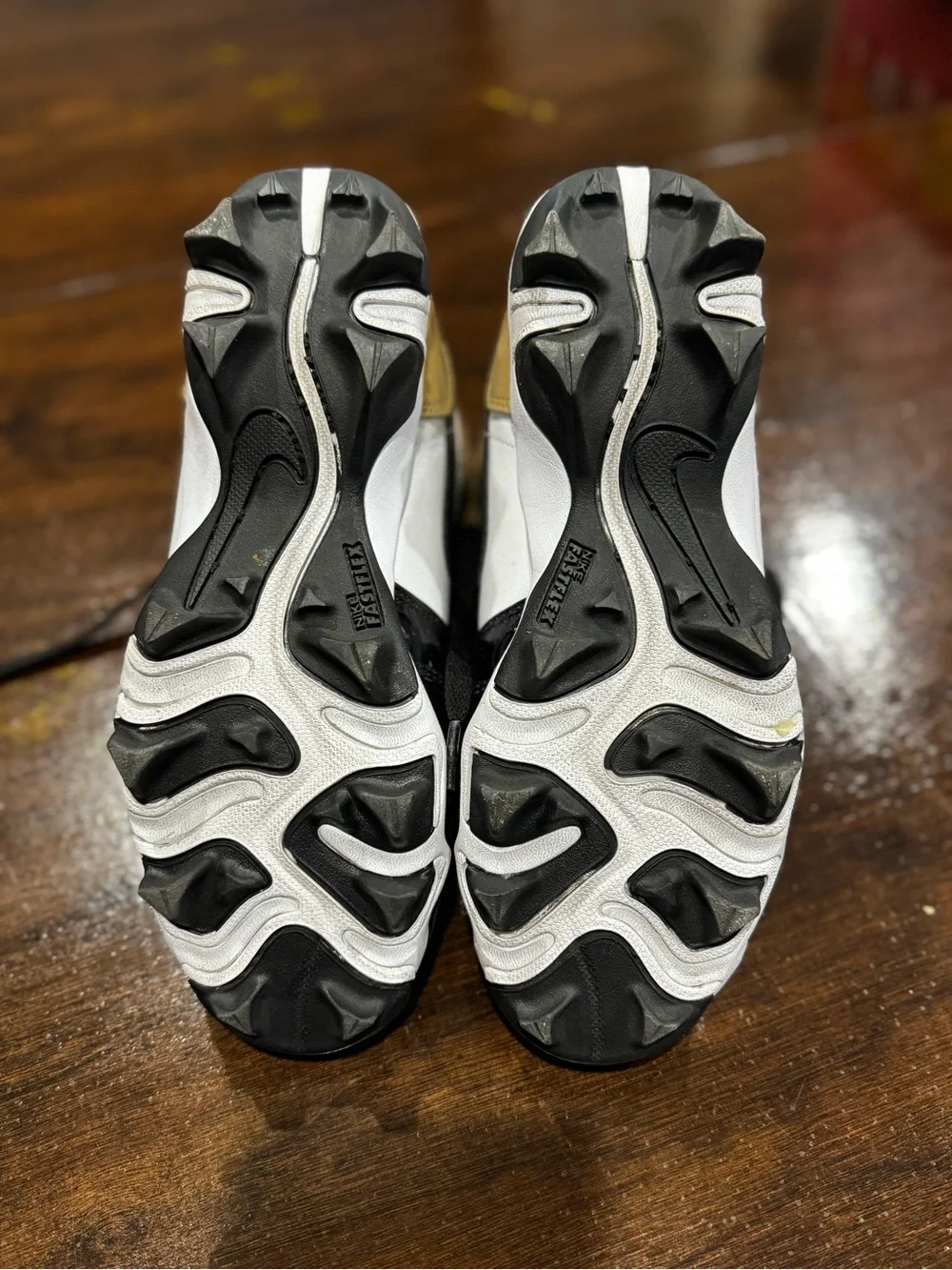 Nike Jordan 1 Kids' mid cleats in Black, White & Gold